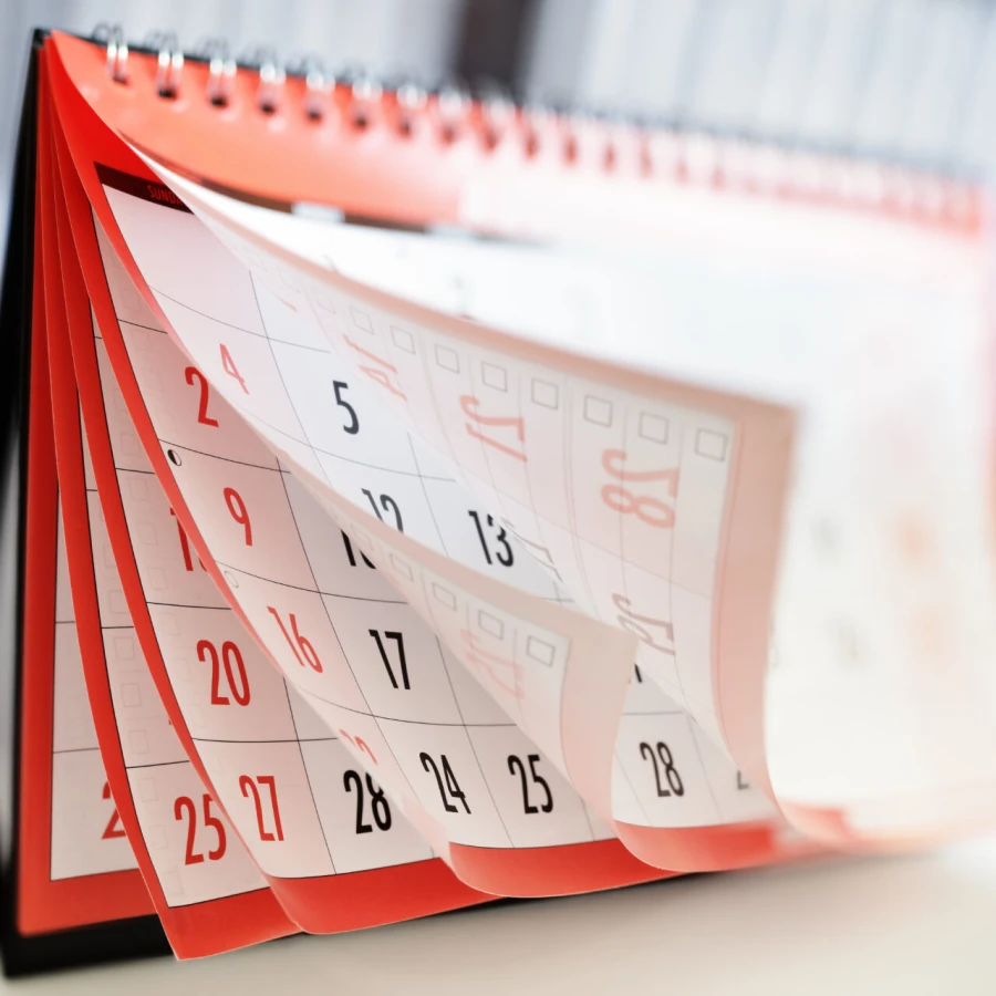 Months,And,Dates,Shown,On,A,Calendar,Whilst,Turning,The