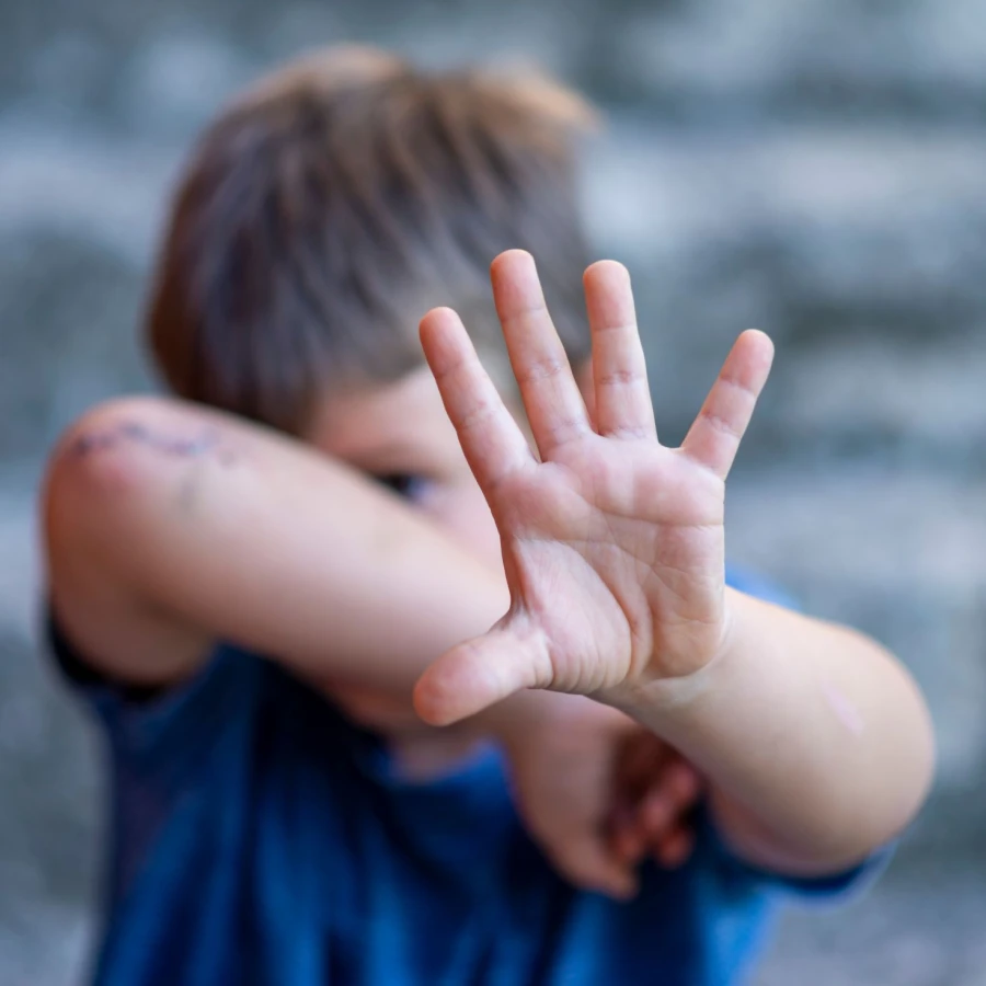 Children,Violence,And,Abused,Concept.,Child,Raising,Hands,To,Protect