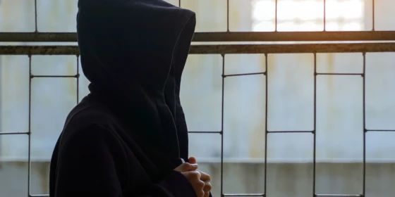 Asian,Boy,Wearing,A,Hoodie,Covering,His,Face,Sits,Alone