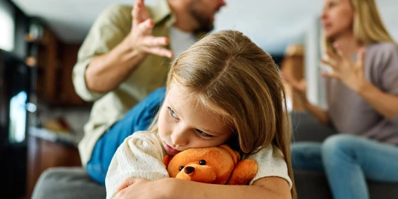Portrait,Of,A,Sad,Child,,A,Little,Girl,,While,Parents