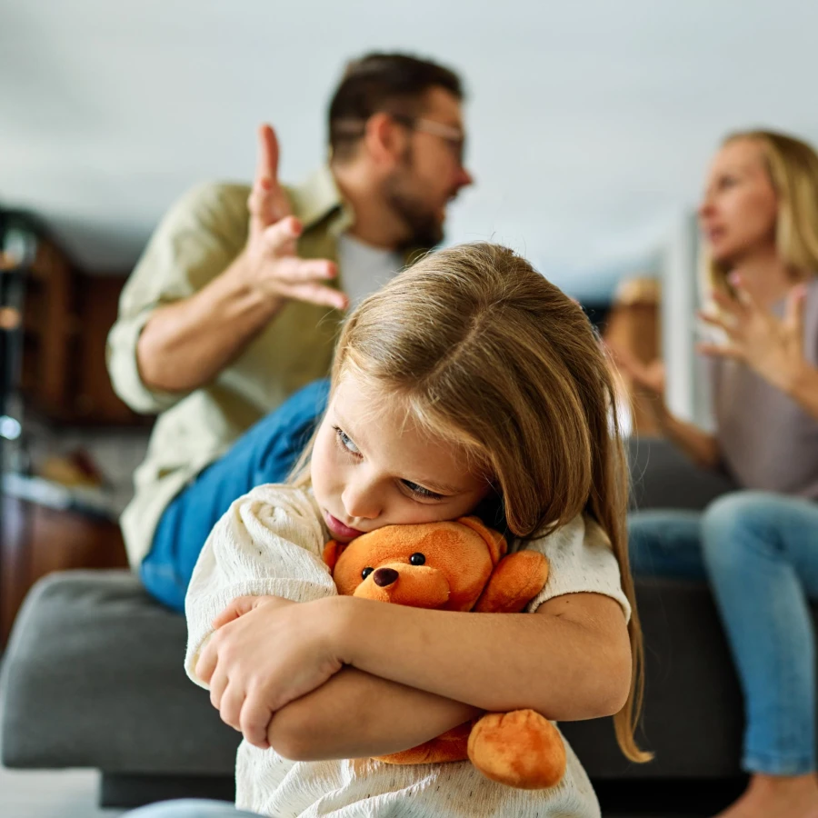 Portrait,Of,A,Sad,Child,,A,Little,Girl,,While,Parents