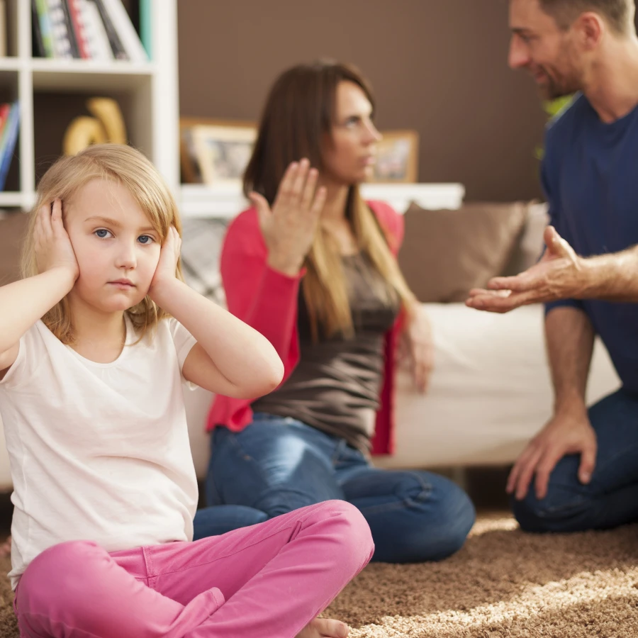 Little girl doesn't want to hear arguing of parents