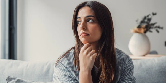 Close,Up,Of,Sad,Pensive,Millennial,Woman,Sit,Alone,Thinking