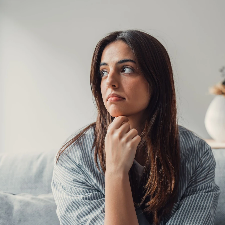 Close,Up,Of,Sad,Pensive,Millennial,Woman,Sit,Alone,Thinking